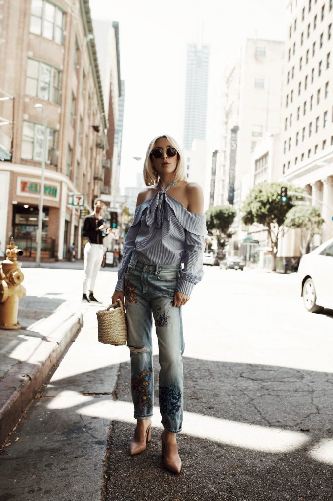 Outfit ideas: embroidered boyfriend jeans, cold shoulder chambray top