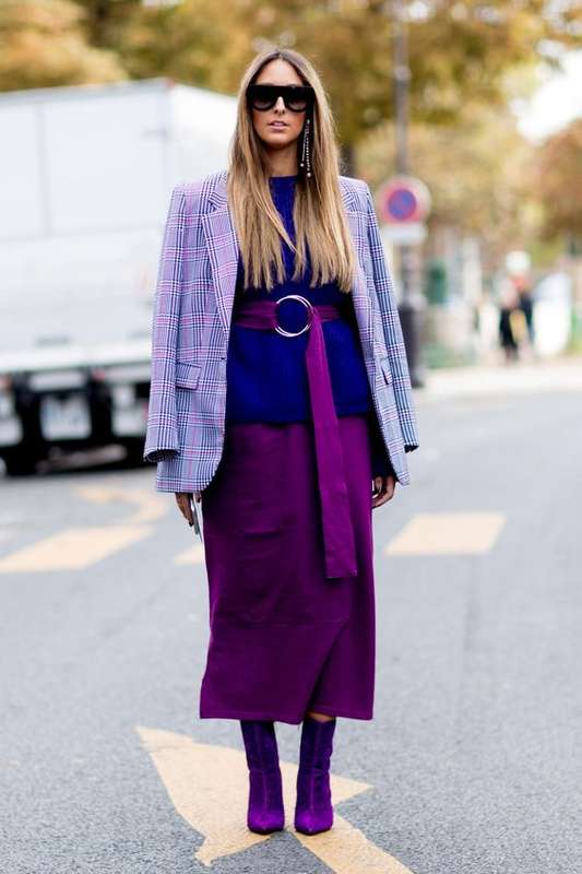 Lavender Outfit Ideas to Try in 2018: Plaid blazers are having a moment. Try a lavender plaid jacket with deep jewel tones like a magenta midi skirt and purple sweater.