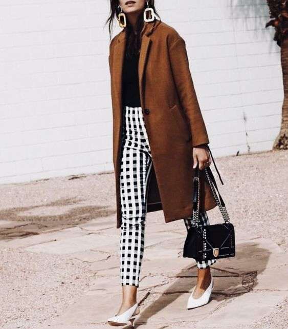 11 Casual Looks that Don't Require your Favorite Pair of Jeans: Printed statement high waited cropped trousers pair perfectly with staple items like a turtleneck and camel coat paired with trending items like white sling back kitten heeled pumps