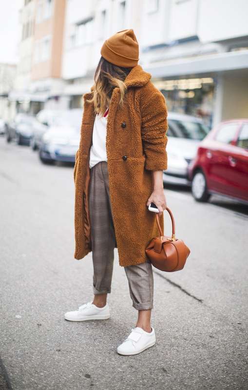 11 Casual Looks that Don't Require your Favorite Pair of Jeans: Plaid trousers and a teddy bear coat paired with sneakers is a cozy casual off duty look