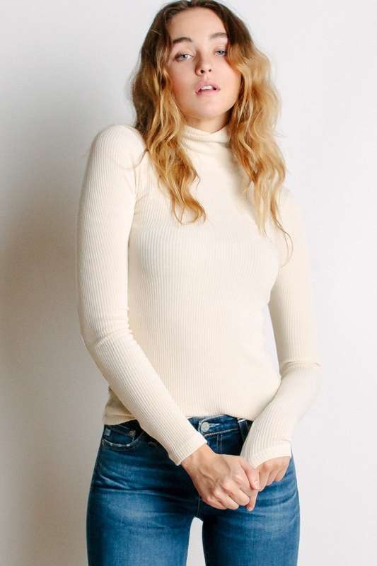 Denim Jacket Outfit Ideas: Layer your turtleneck under your favorite denim jacket