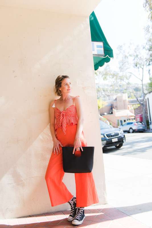 Everyday outfit ideas: Bold Color! We're loving this tangerine gingham tie front top and linen high waist pant by faithfull the brand. Pair your bold set back to black high top sneakers