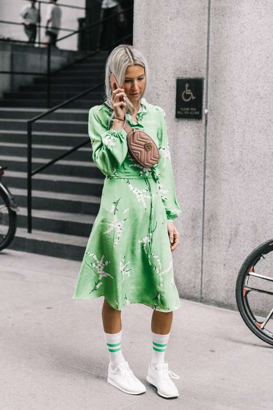 Would you wear sneakers and athletic socks with your vintage dress? We're loving this edgy bold color outfit idea.