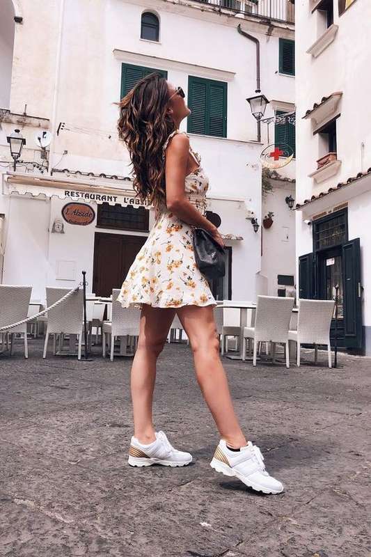 Cool girl style to steal! Pair your flirty printed mini dresses with trending sneakers